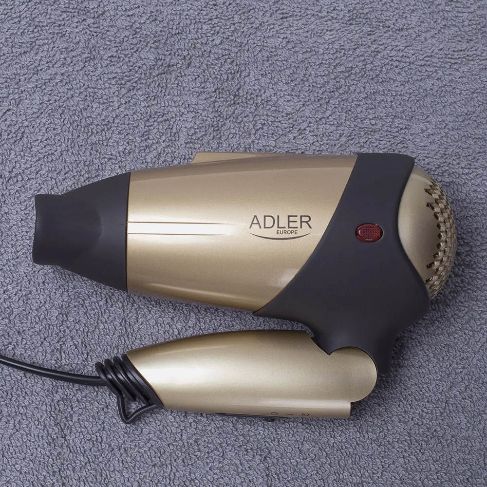 Secador 1600w 2 Niv. Fuerza/temperatura Aire Frio Asa Plegable Y Colgante Tapa De Goma