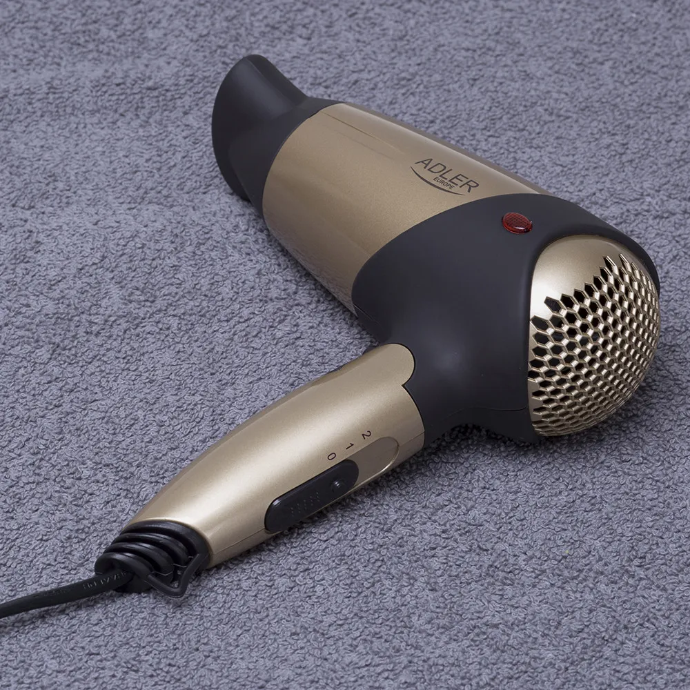 Secador 1600w 2 Niv. Fuerza/temperatura Aire Frio Asa Plegable Y Colgante Tapa De Goma