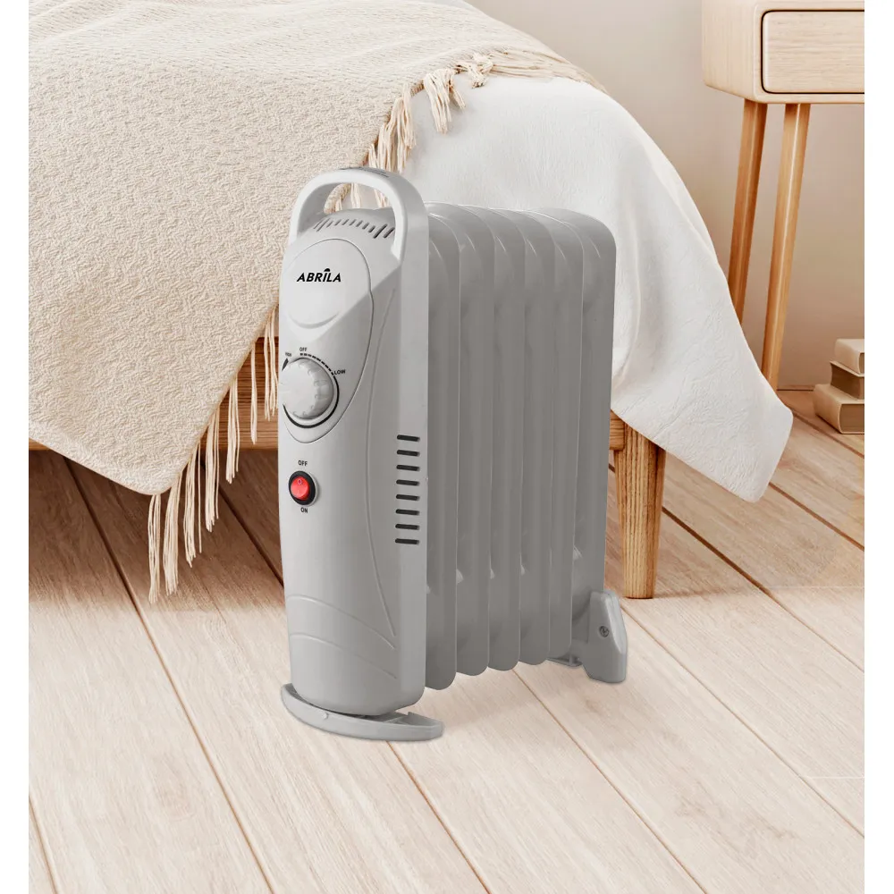 Radiador Aceite Confort 700w 7element Termostato Reg Protec.sobrecalent. Luz Indicadora Asa 37x27,5x14 Cm